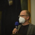 an audience member asks a question