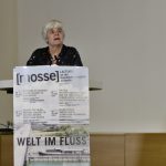 Janet Hartley speaks from the podium