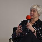 Janet Hartley speaks into the mic