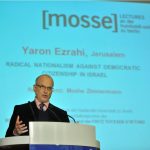 Ezrahi lectures from the podium