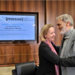 Lachenmann and Weiss embrace after their conversation