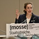 Kaiser speaks from the podium