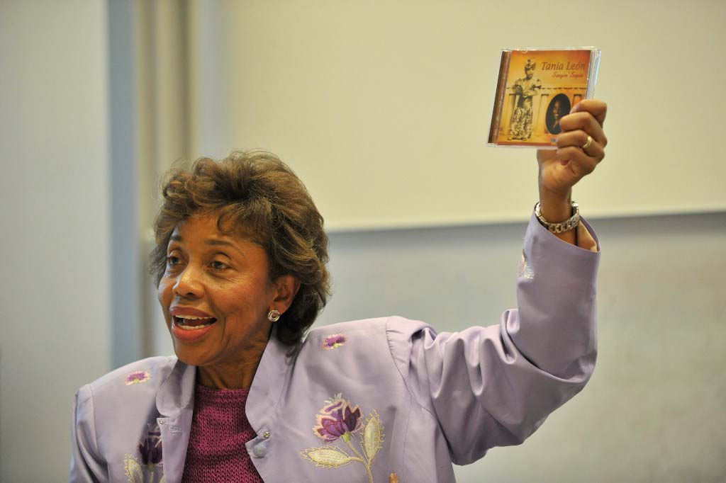 León holds up her CD