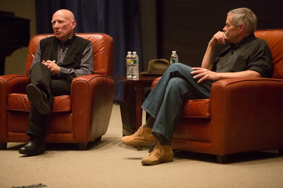 Salgado engaged in a Q&A with the audience, moderated by Lesley professor Christopher James (right), director of the MFA in Photography.
