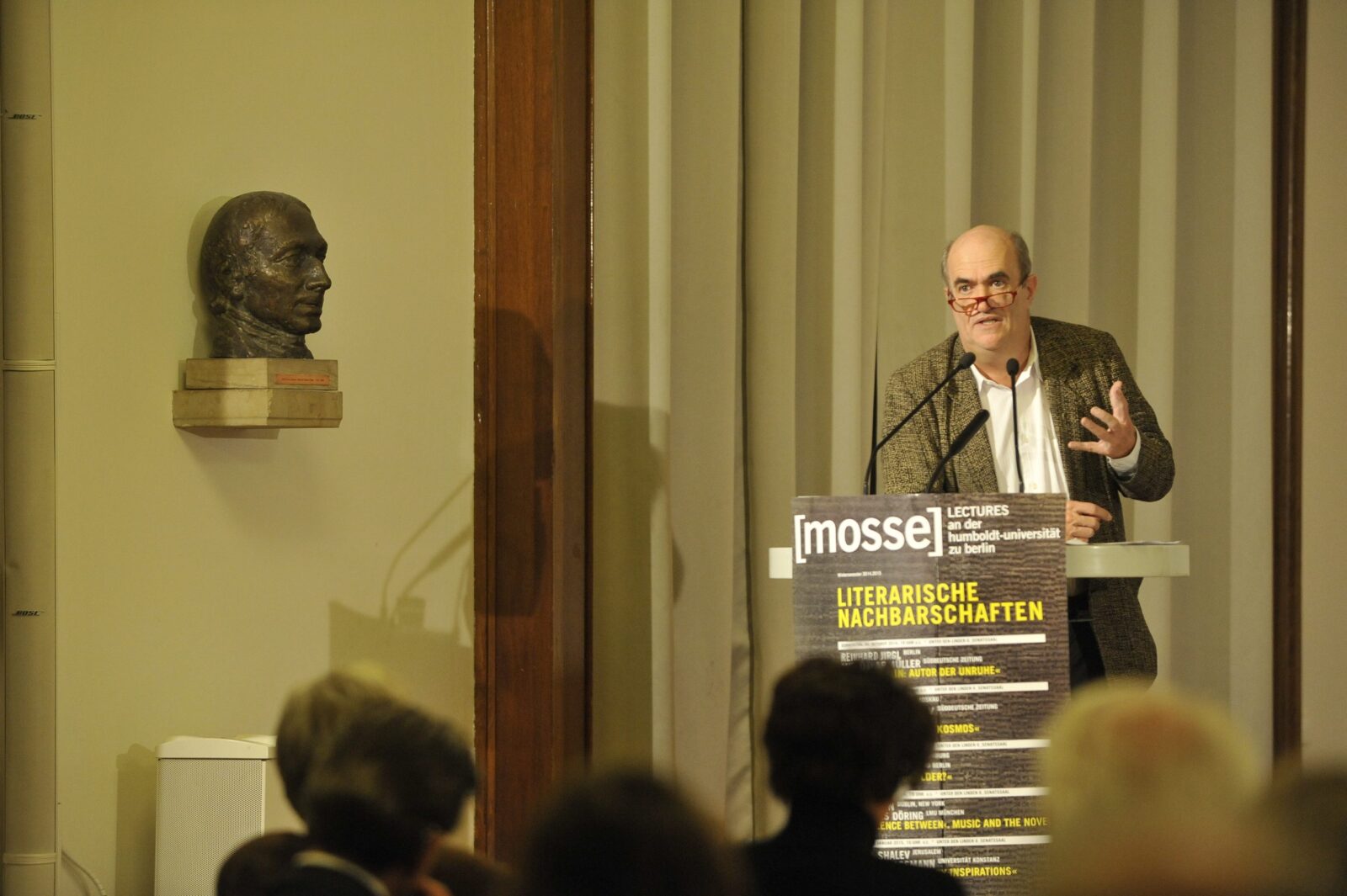Colm Toibin lectures from the podium