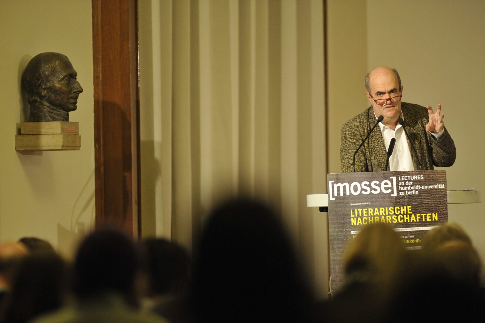 Colm Toibin lectures from the podium