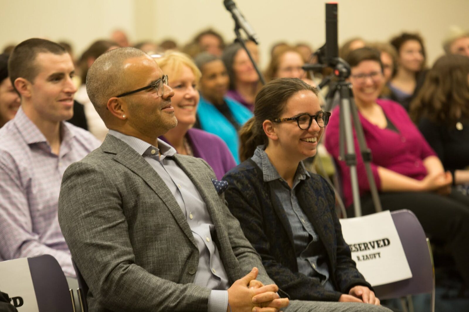 Christopher Jackson and senior Nicole Mello. Mello, a double major in American History and Creative Writing, introduced Jackson to the crowd.