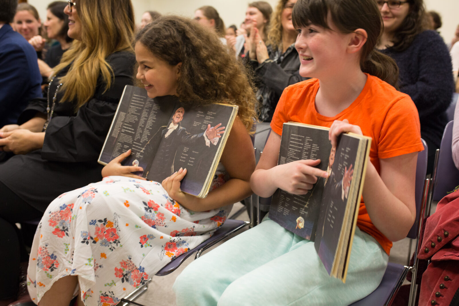 Two young fans at the lecture came with copies of the "Hamilton" book of lyrics.