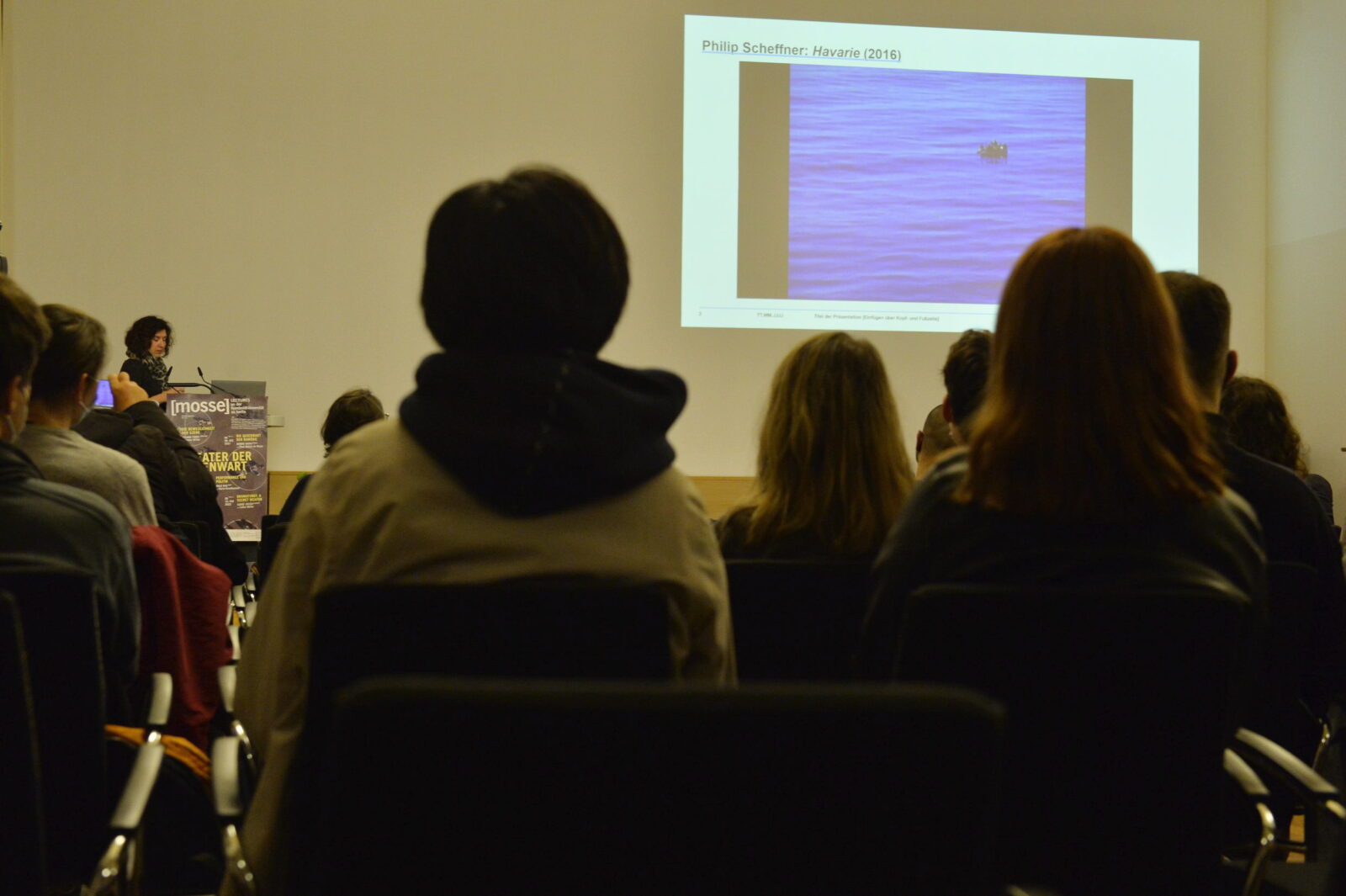Juliane Vogel speaking in front of the audience