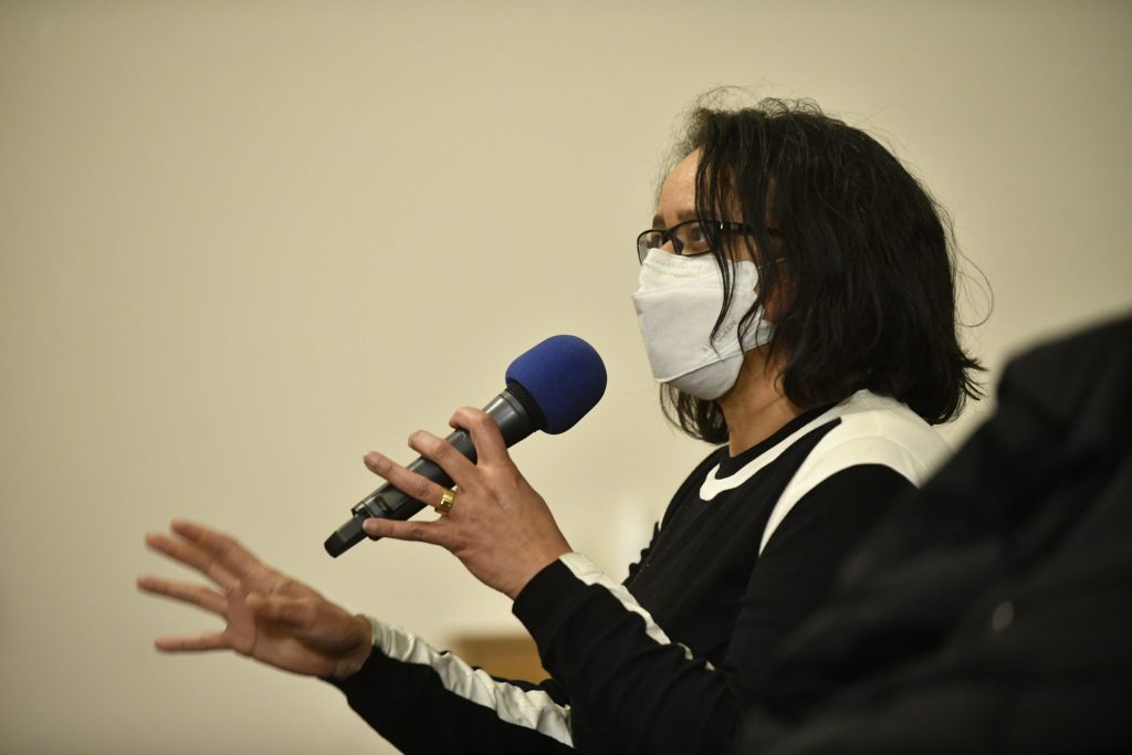 an audience member asks a question