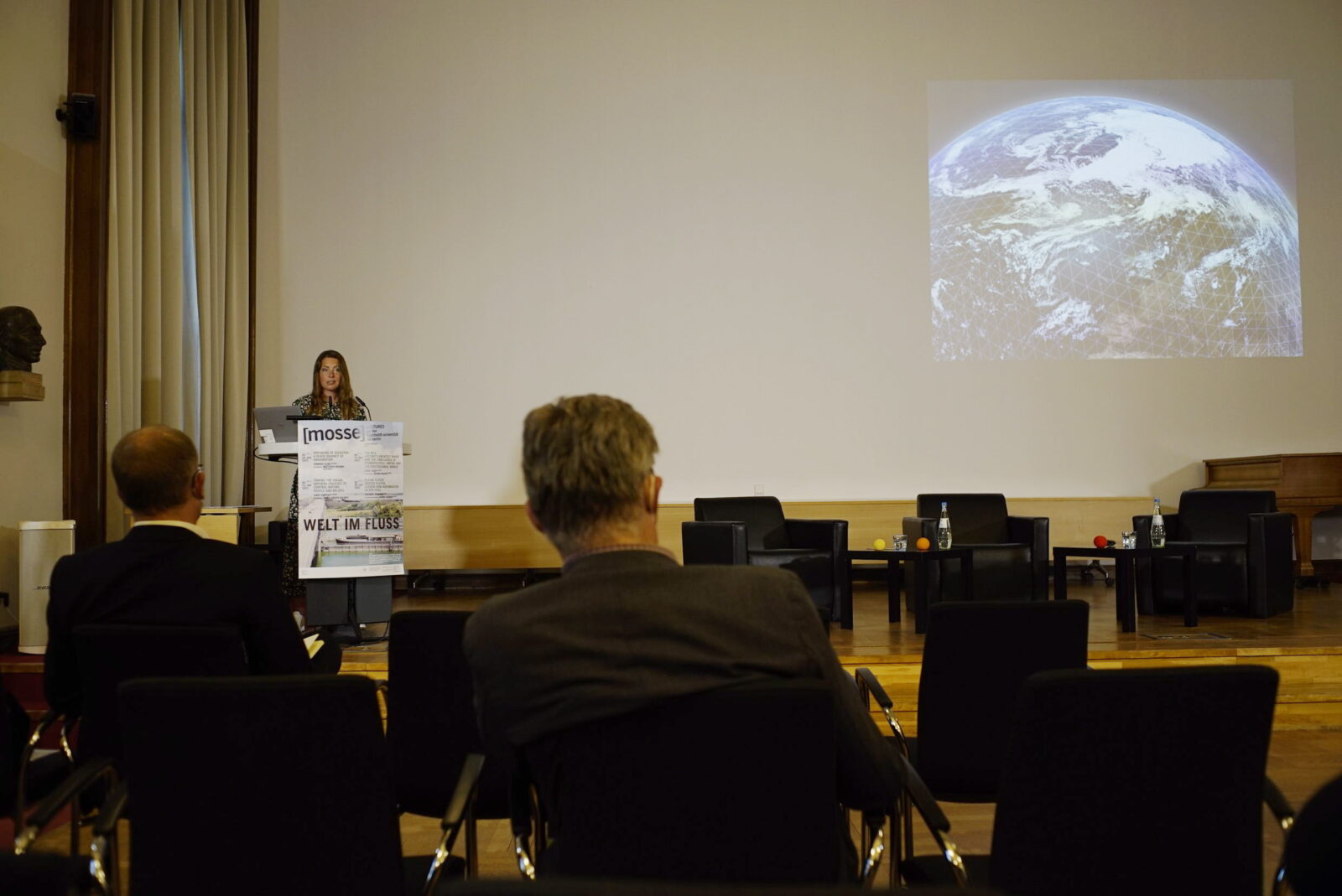 Hannah Cloke lecturing at the podium