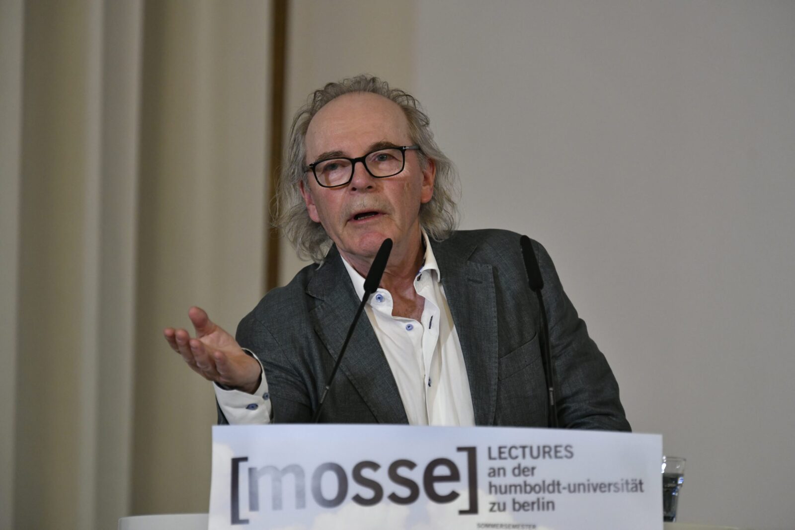 Terje Tvedt lectures at the podium