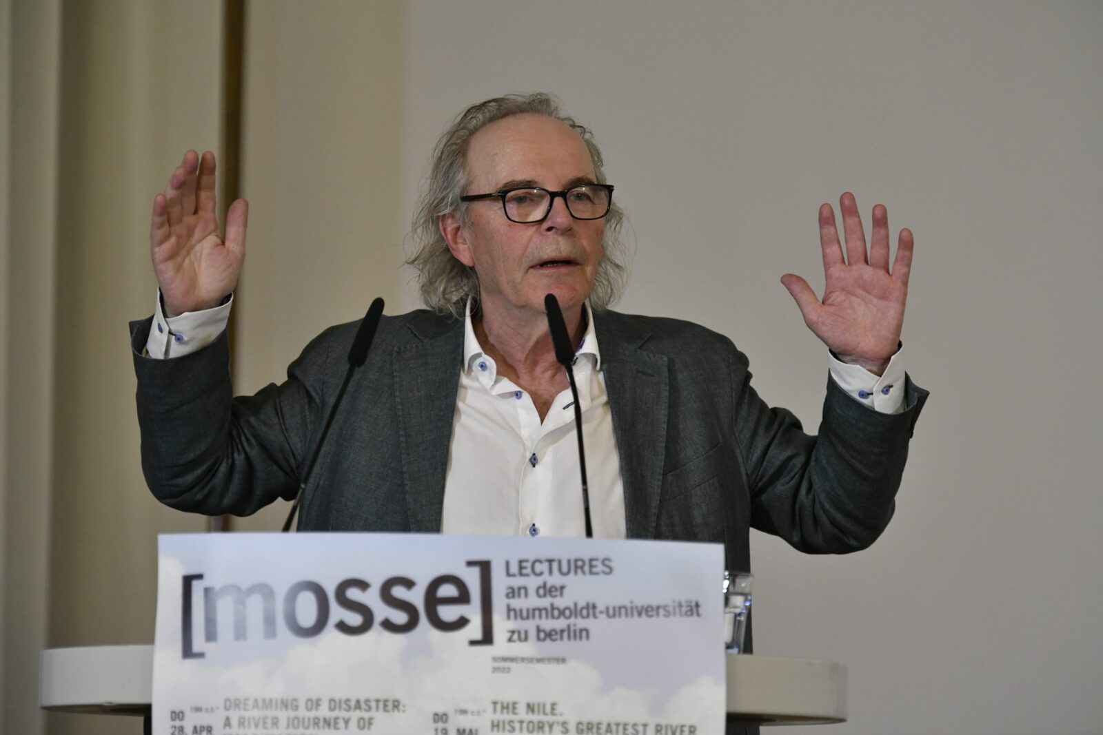Terje Tvedt lectures at the podium