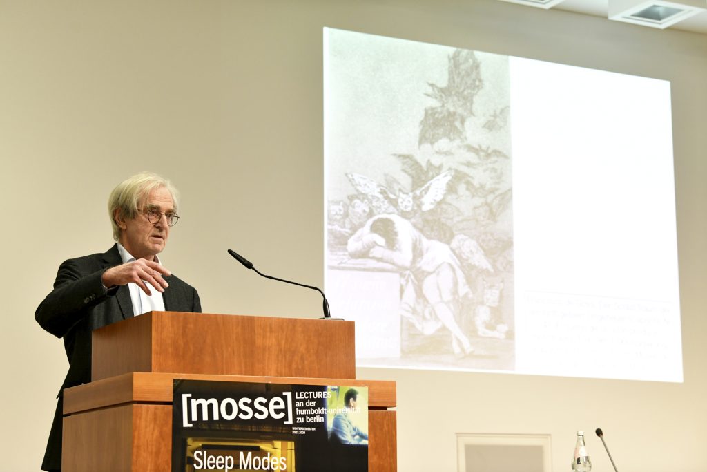 Hartmut Böhme during his lecture, with slide in background