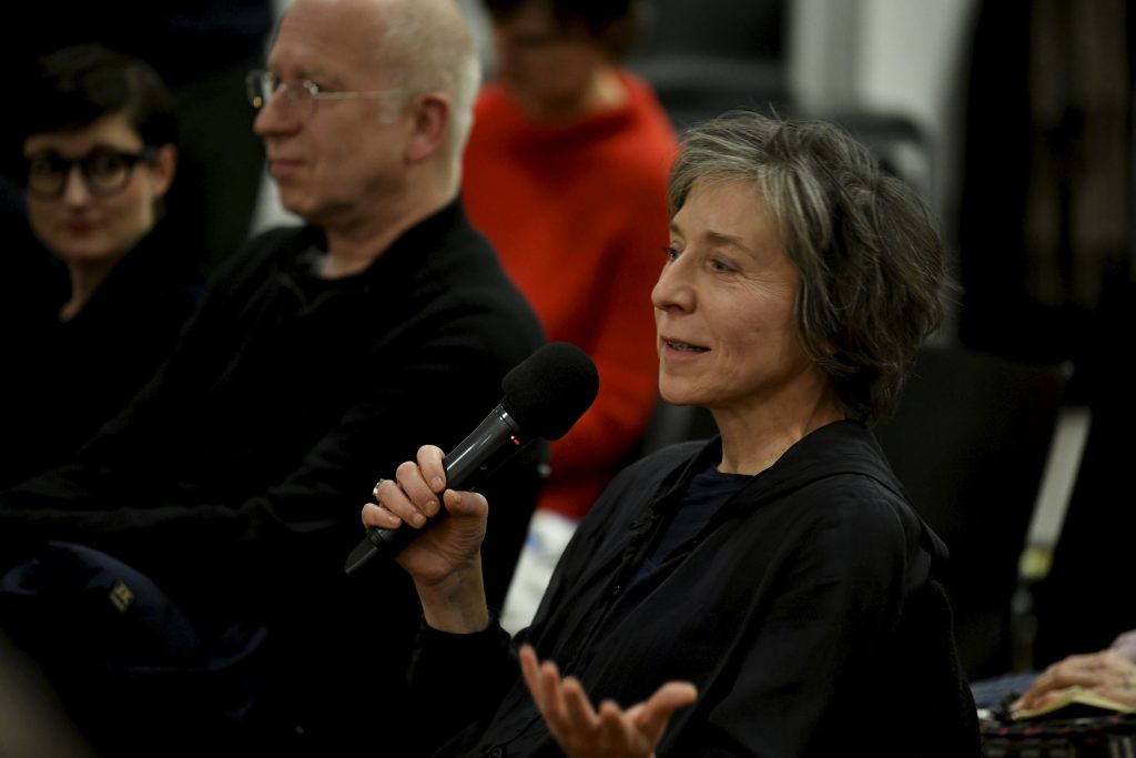 an audience member asks a question