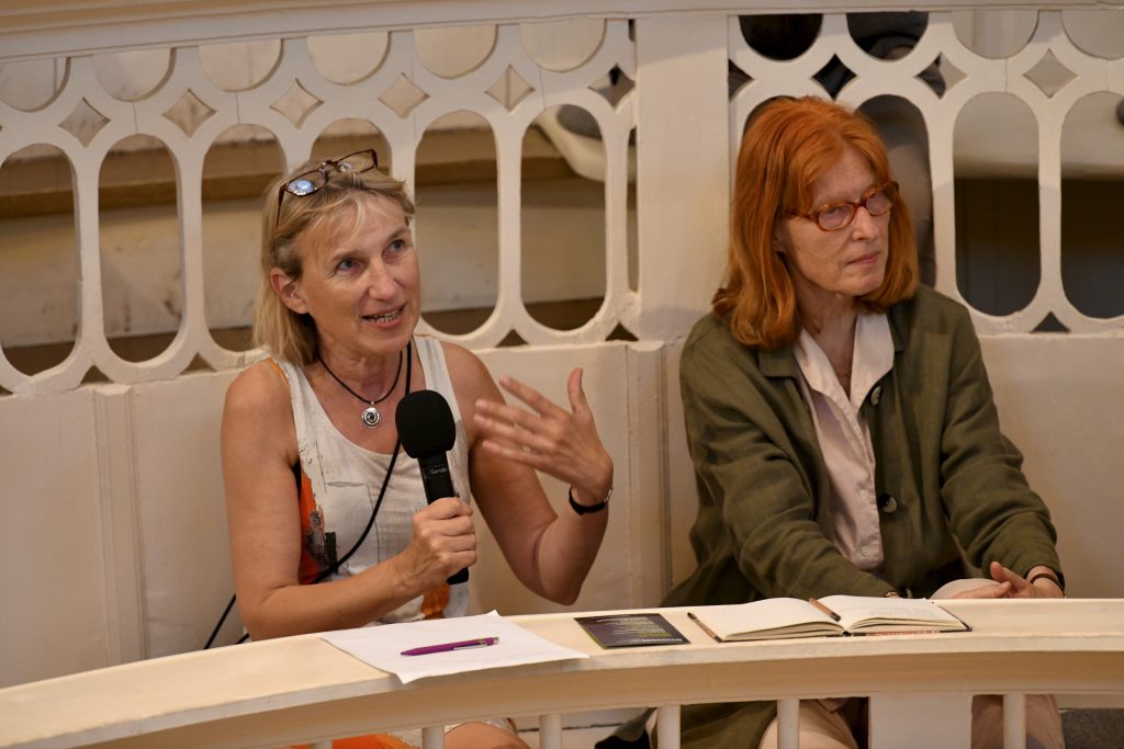 an audience member poses a question