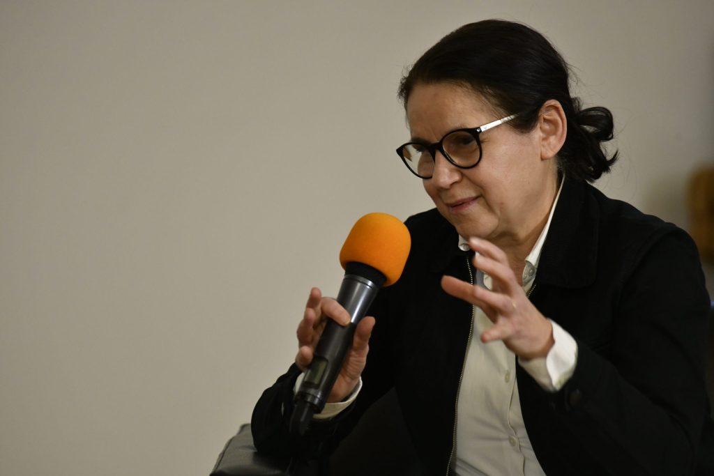 Enyedi speaks into the microphone