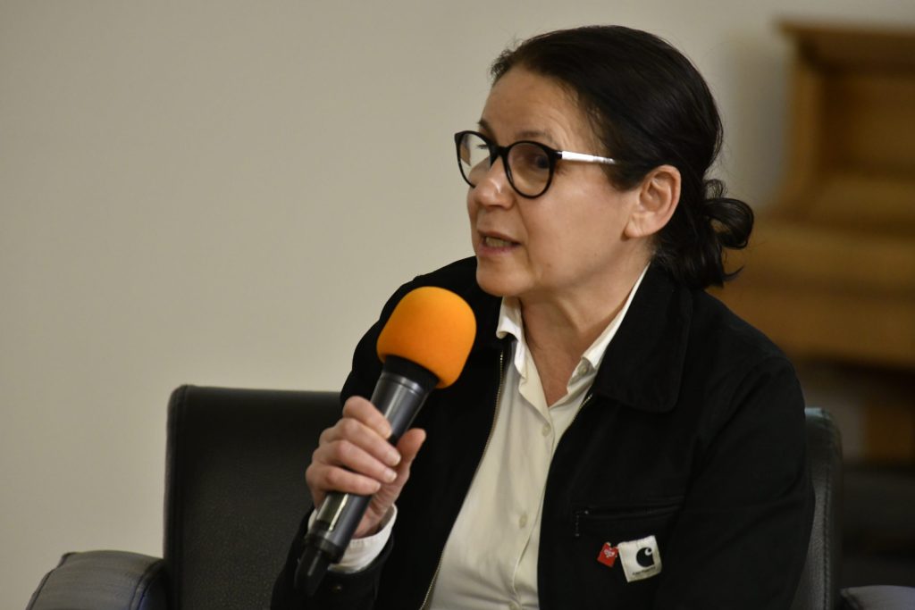 Enyedi speaks into the microphone