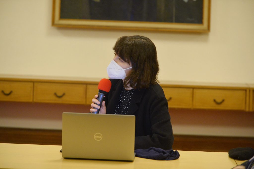 An audience member asks a question