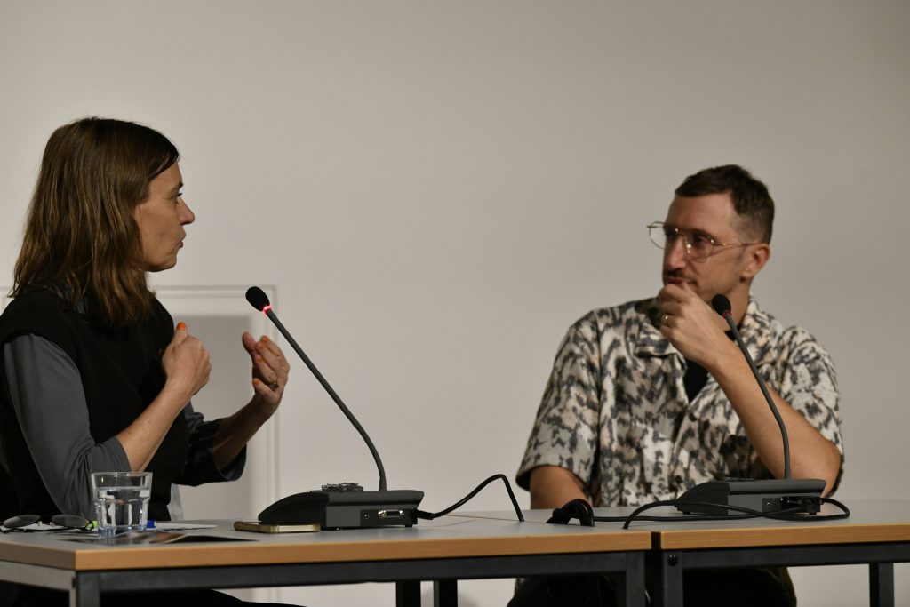 Hamdan in discussion with Britta Lange