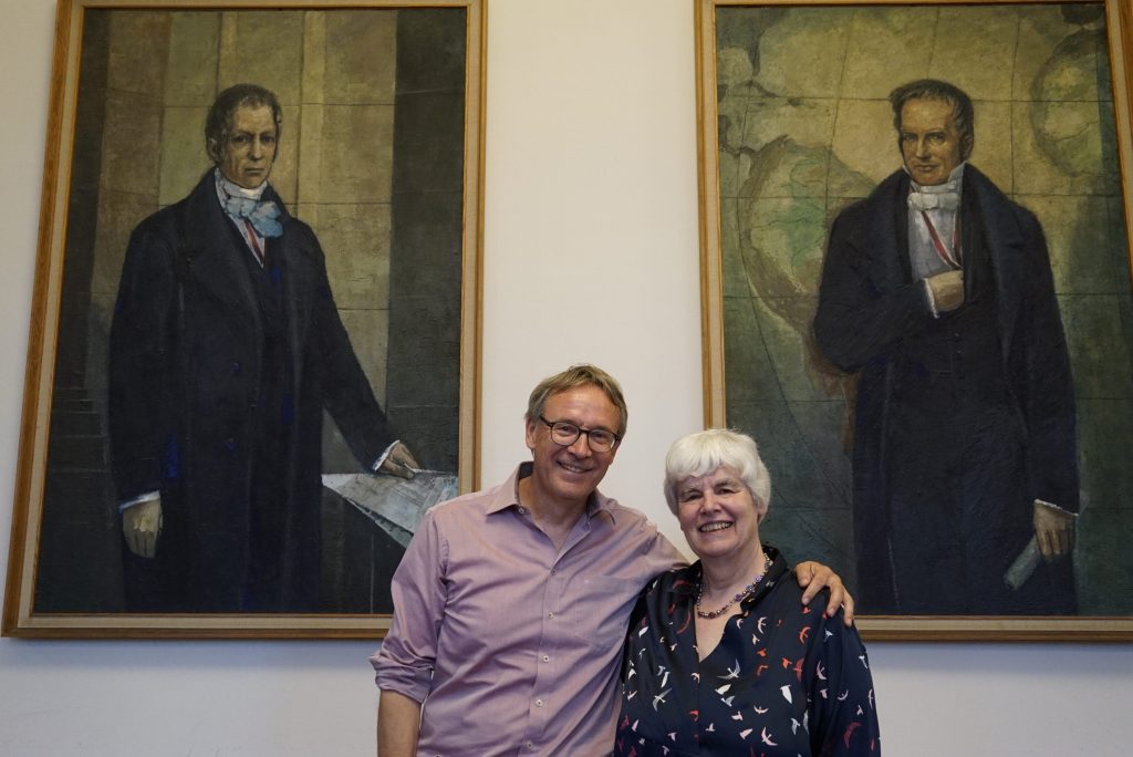 Hartley and Balmes next to portraits of Wilhelm and Alexander von Humboldt