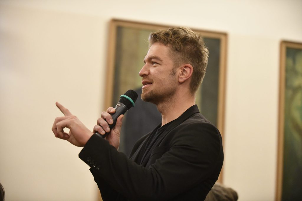 an audience member asks a question