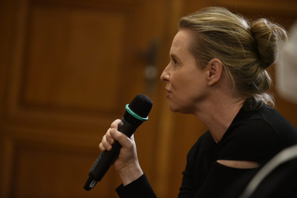 an audience member asks a question