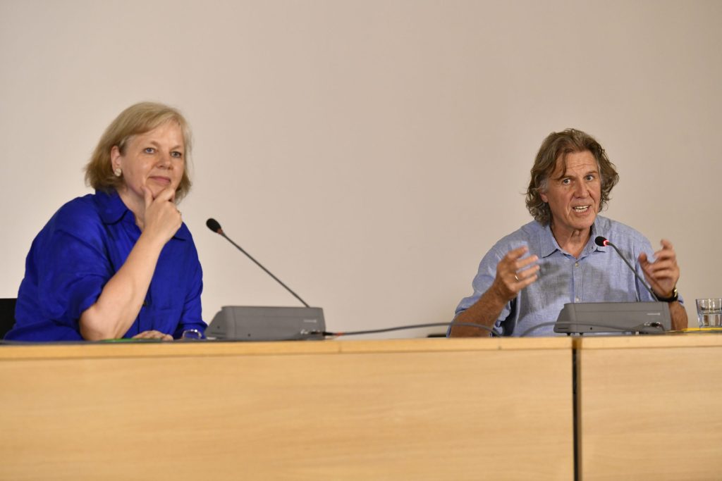 Scheuer and Vedder address the audience