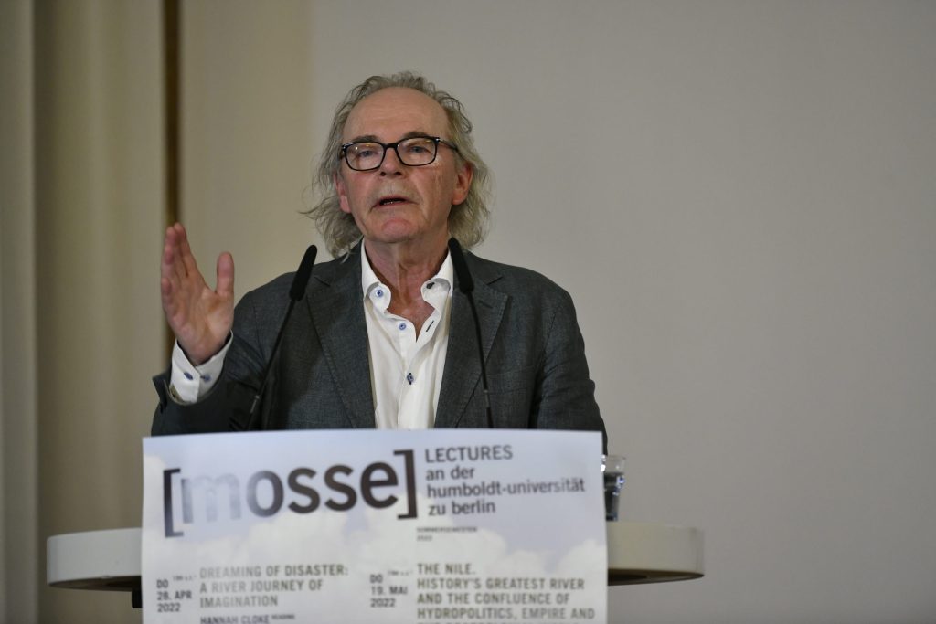 Tvedt lectures at the podium