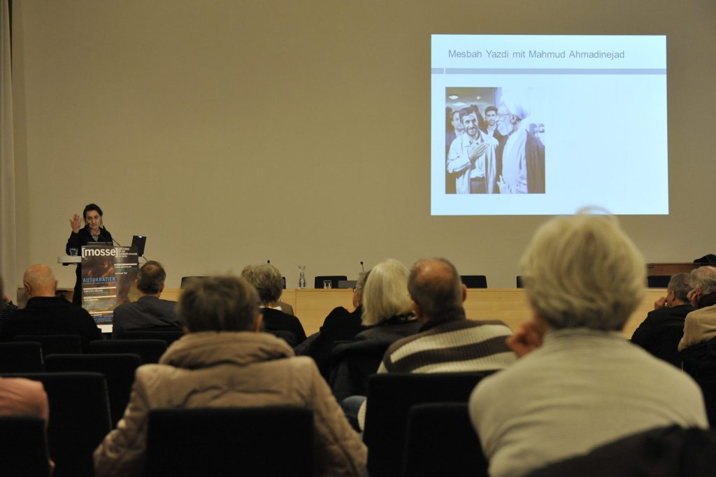 Amirpur delivers her lecture, with slide in the background