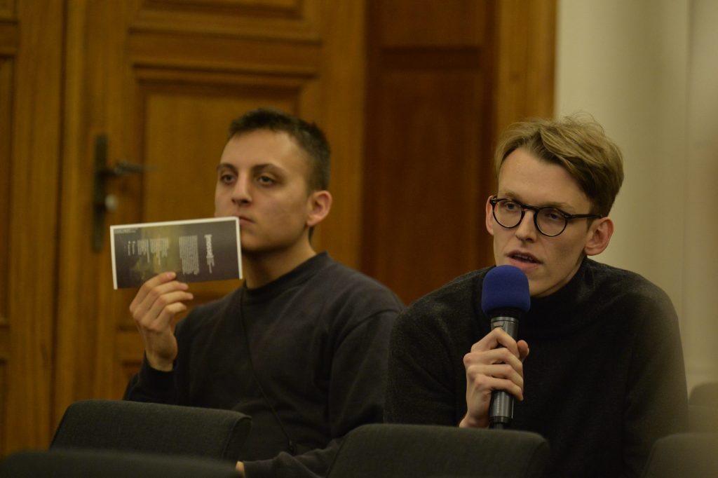an audience member speaks