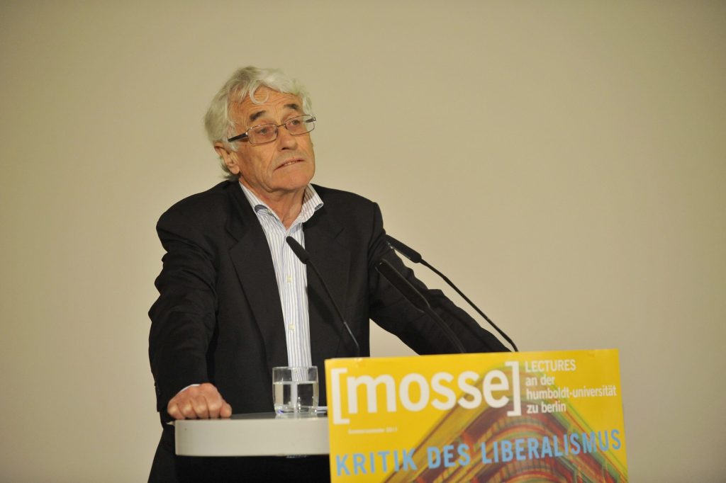 Crouch lectures from the podium