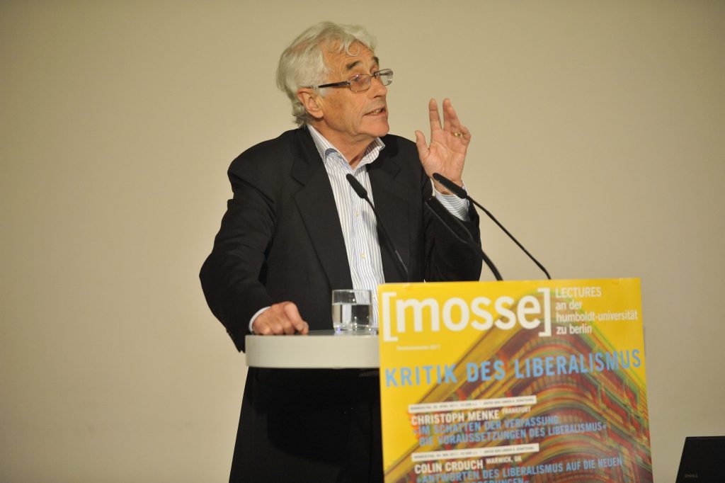 Crouch lectures from the podium