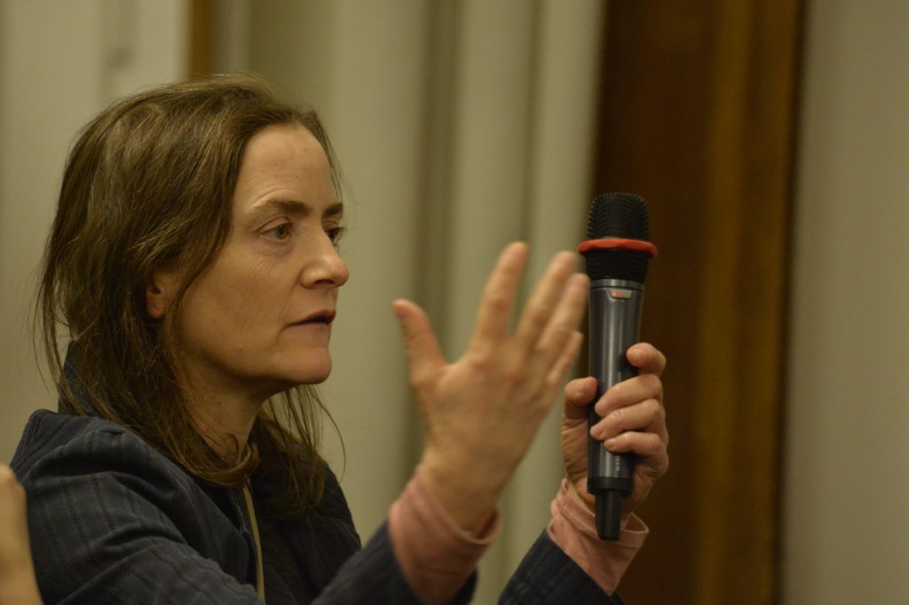 an audience member asks a question