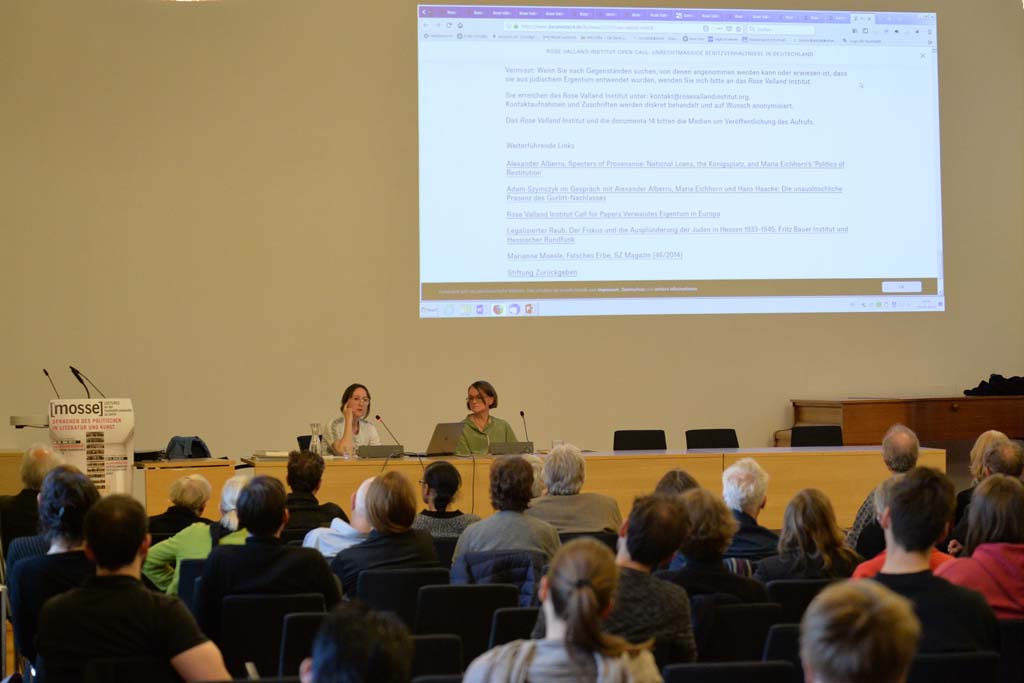 Eichhorn and Buchmann address the audience