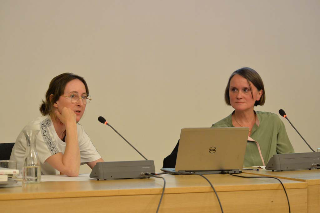 Eichhorn and Buchmann address the audience