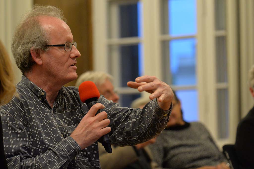 an audience member asks a question