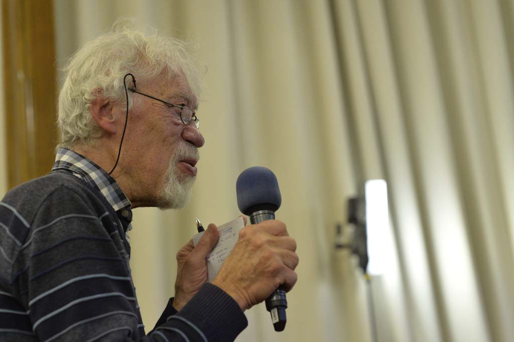 an audience member asks a question