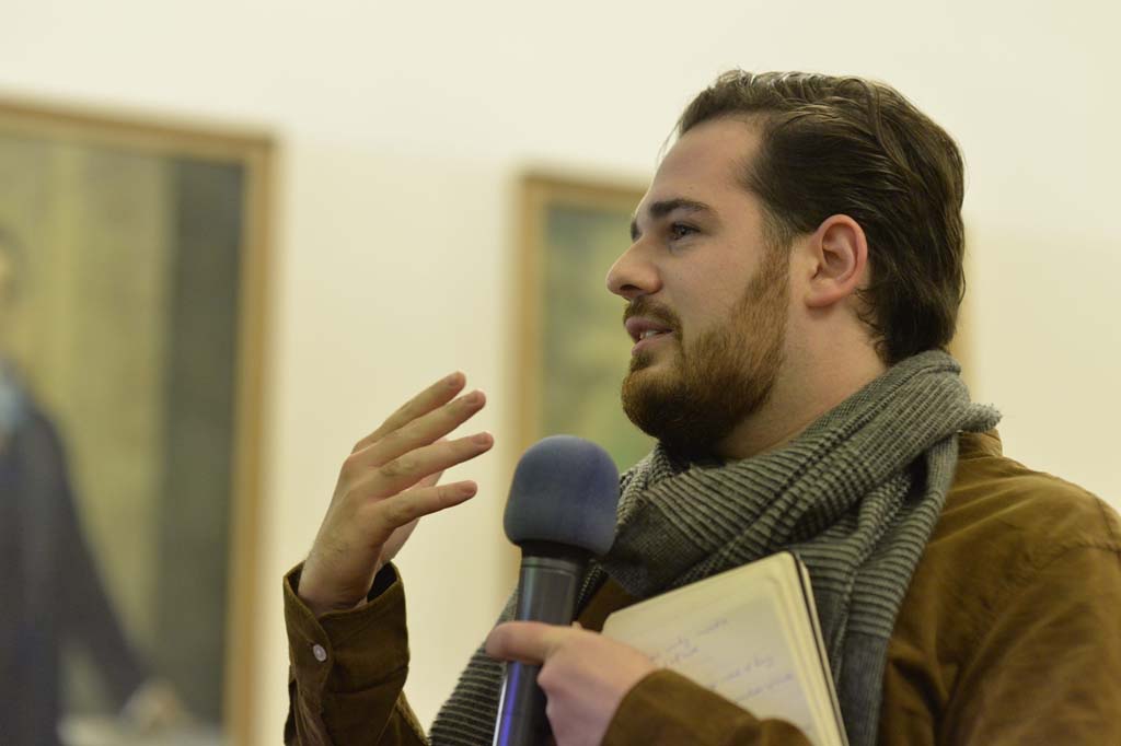 an audience member asks a question