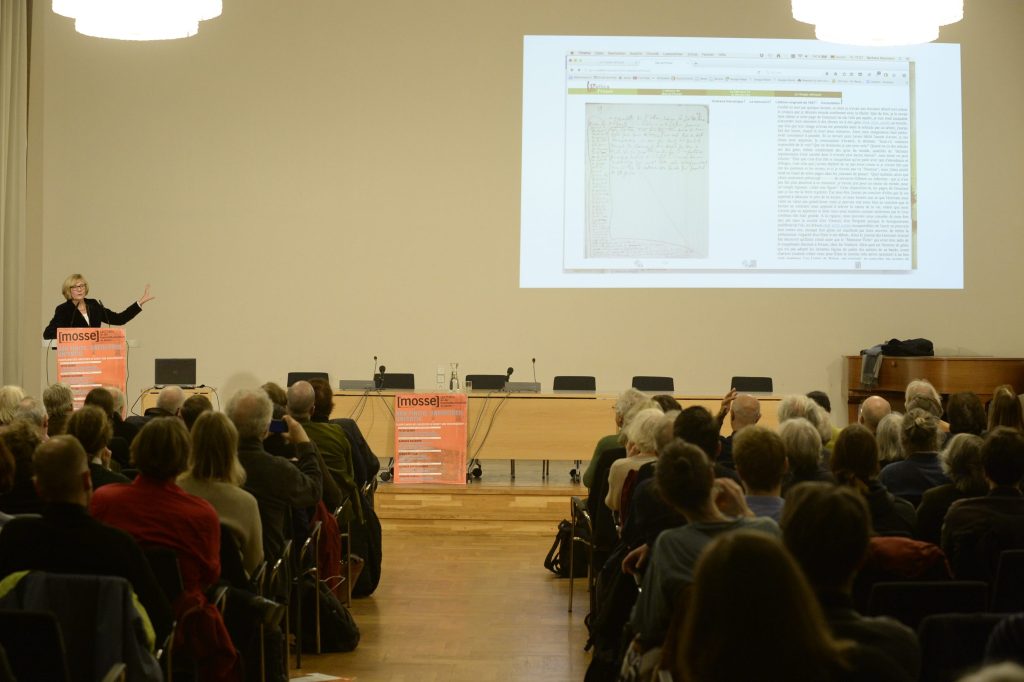the audience listens to the lecture