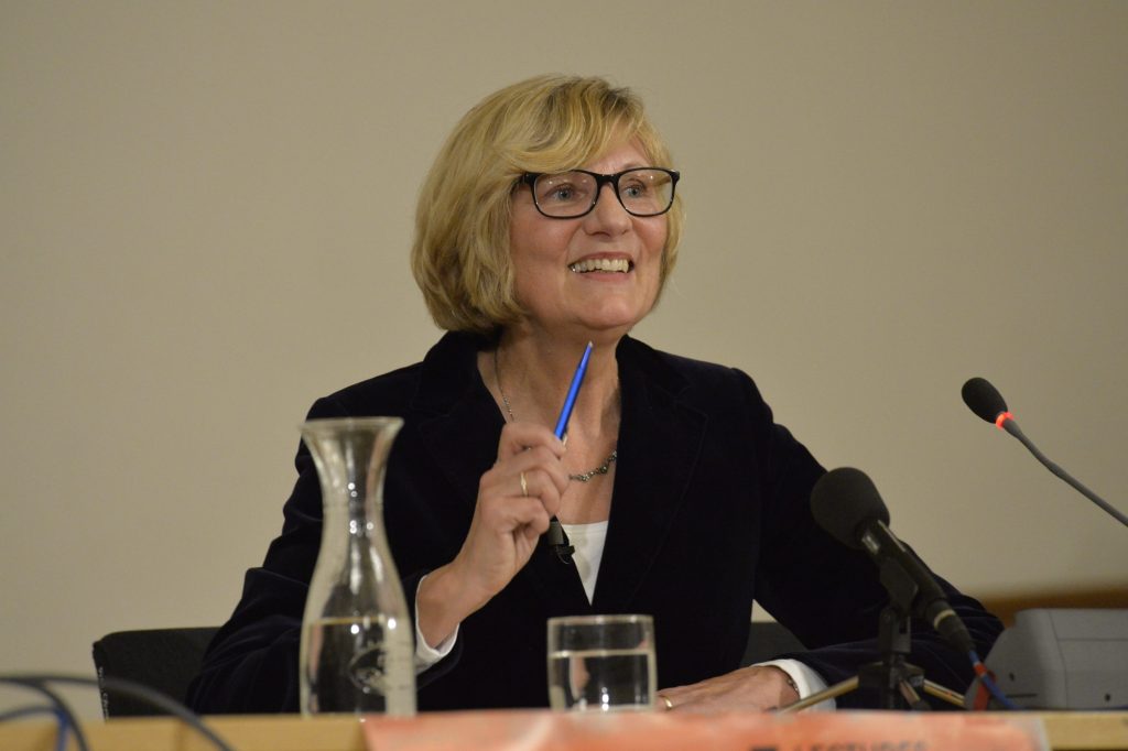 Naumann addresses the audience