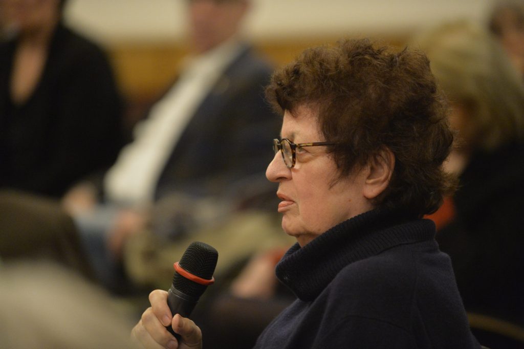 an audience member asks a question