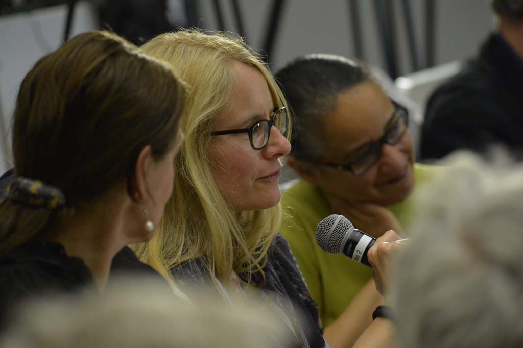 an audience member asks a question