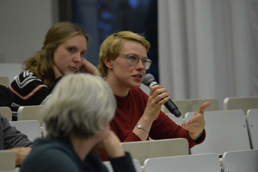 an audience member asks a question