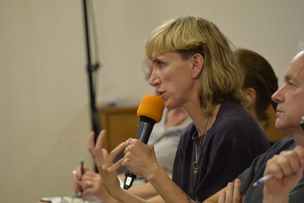 an audience member asks a question
