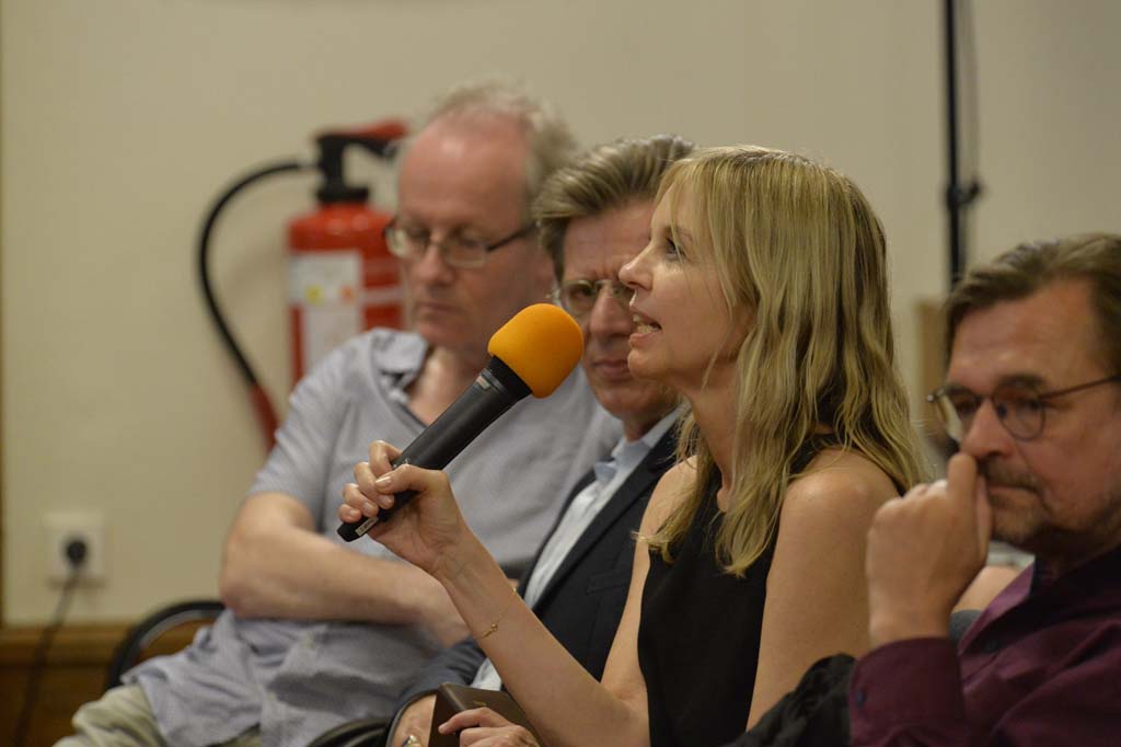 an audience member asks a question