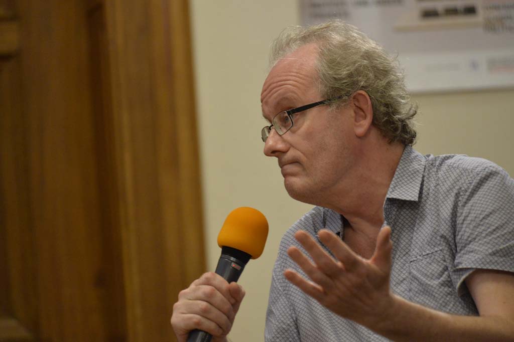 an audience member asks a question