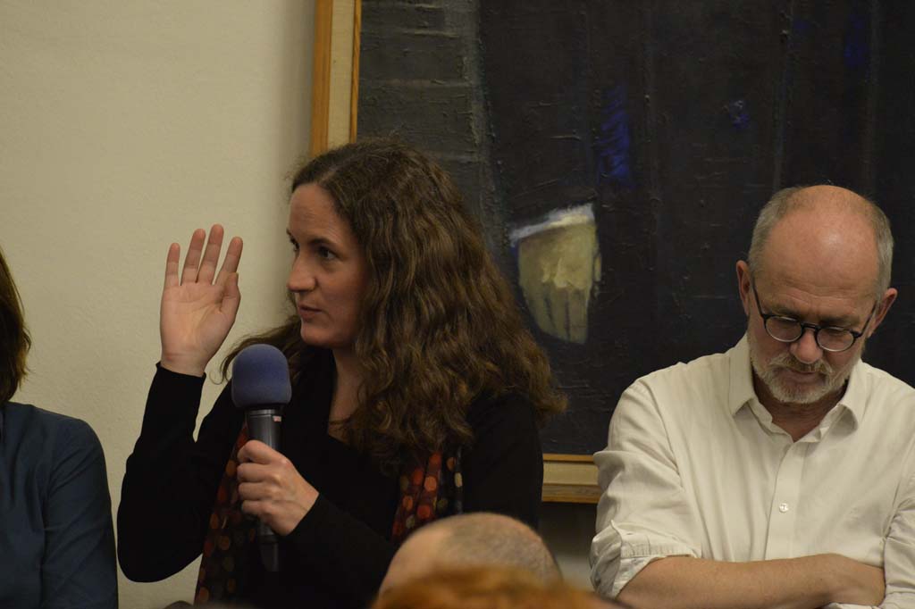 an audience member asks a question