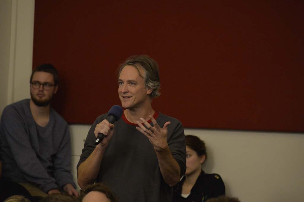 an audience member asks a question