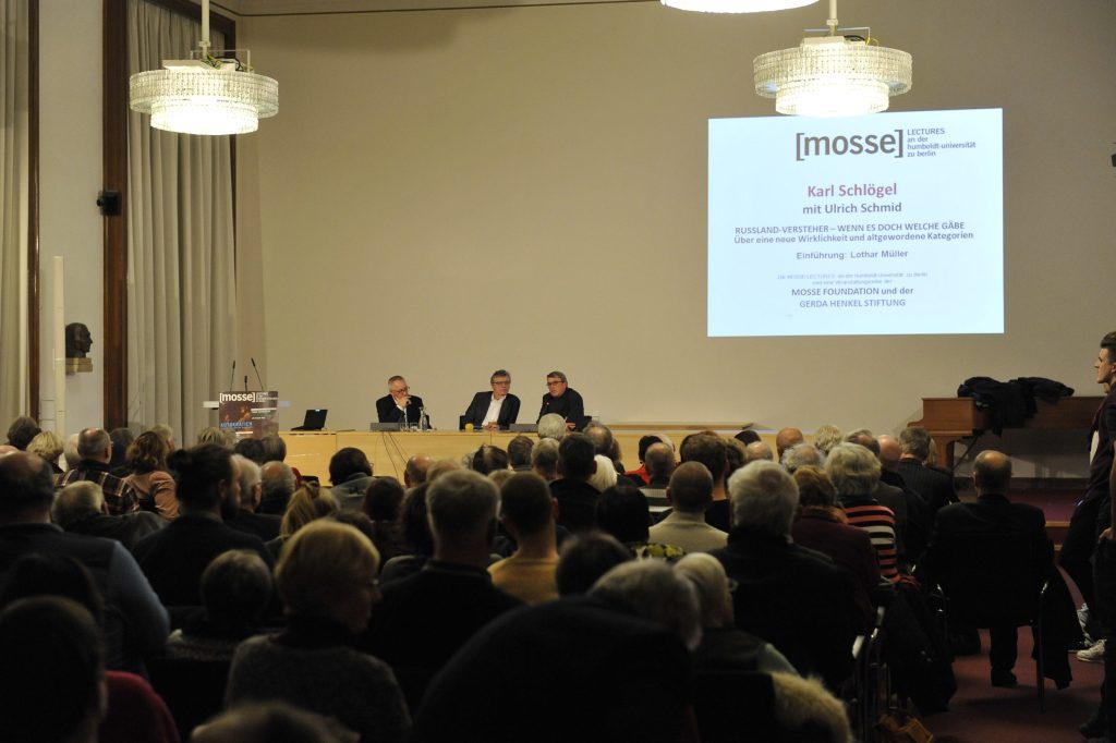 Schlögel and Schmid in conversation, with the audience in the foreground